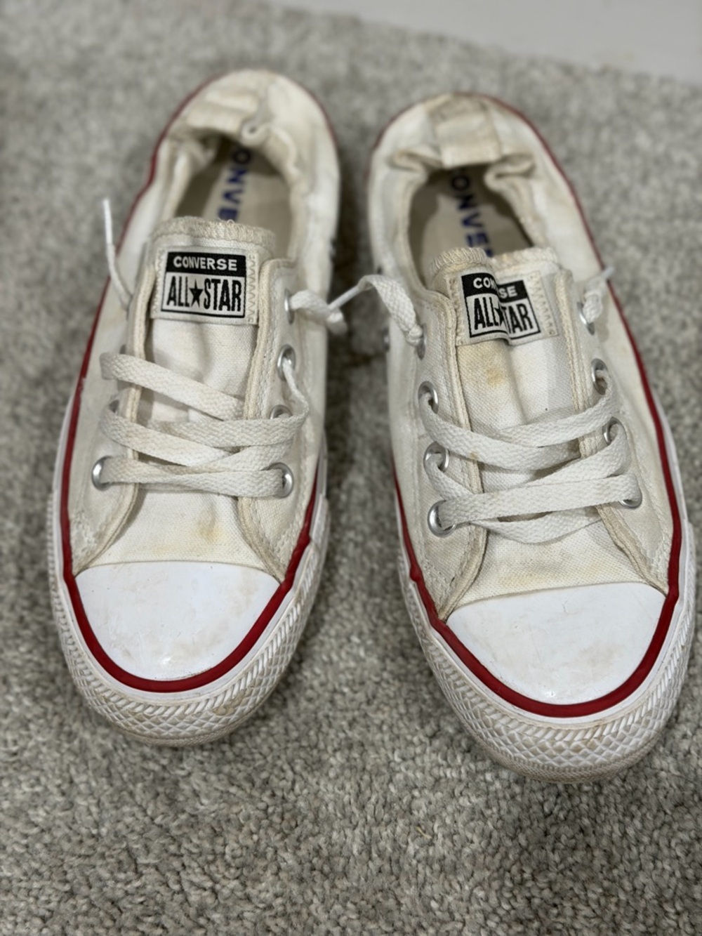 Converse White Low-Top Sneakers with Red Trim Slip on